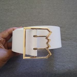 Wide white belt with gold accent